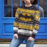 Dark Knight Style Festive Blue Knit Sweater with Gold Batman Logo