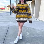 Dark Knight Style Festive Blue Knit Sweater with Gold Batman Logo